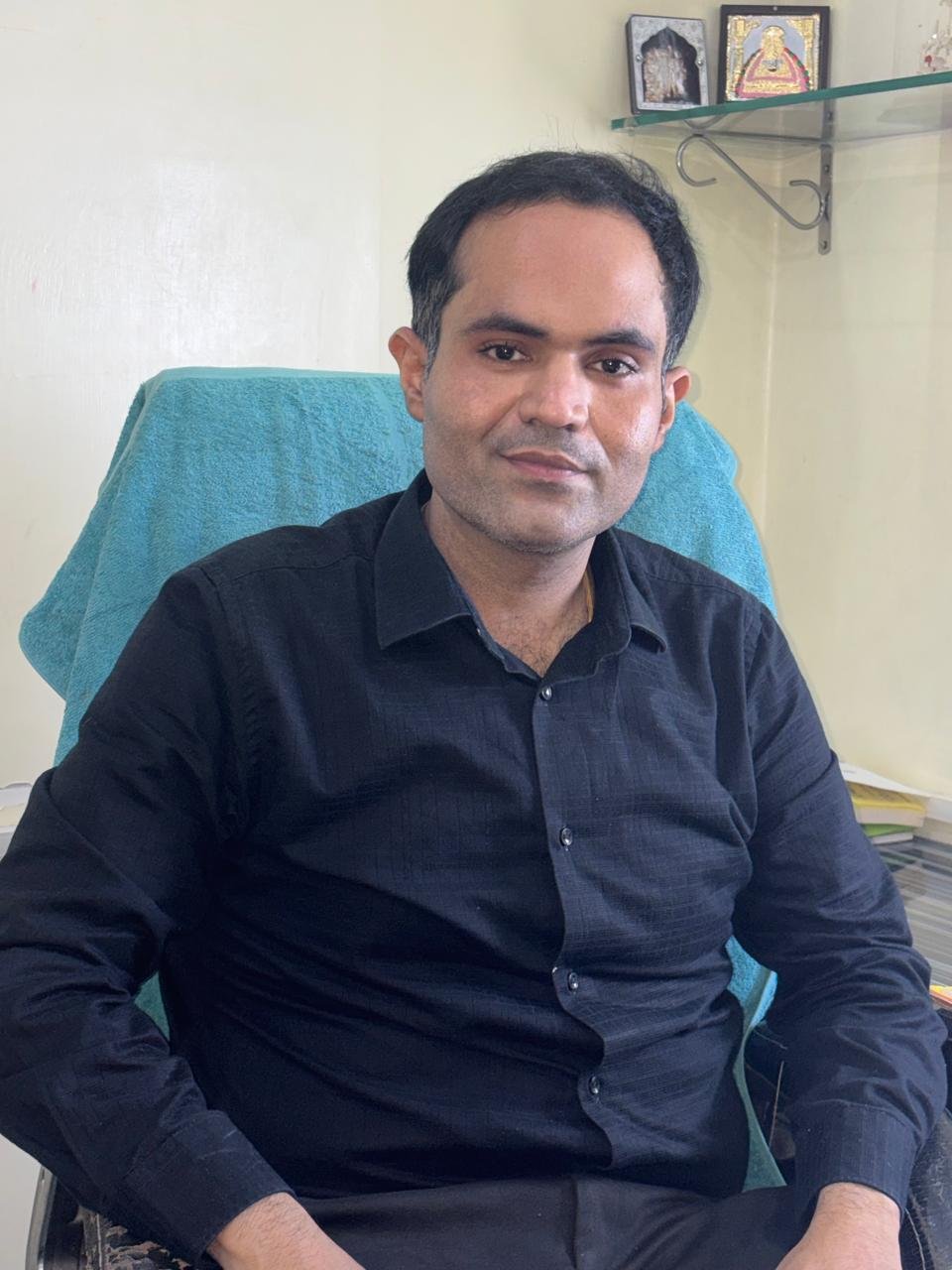 Dr Kundan at the clinic